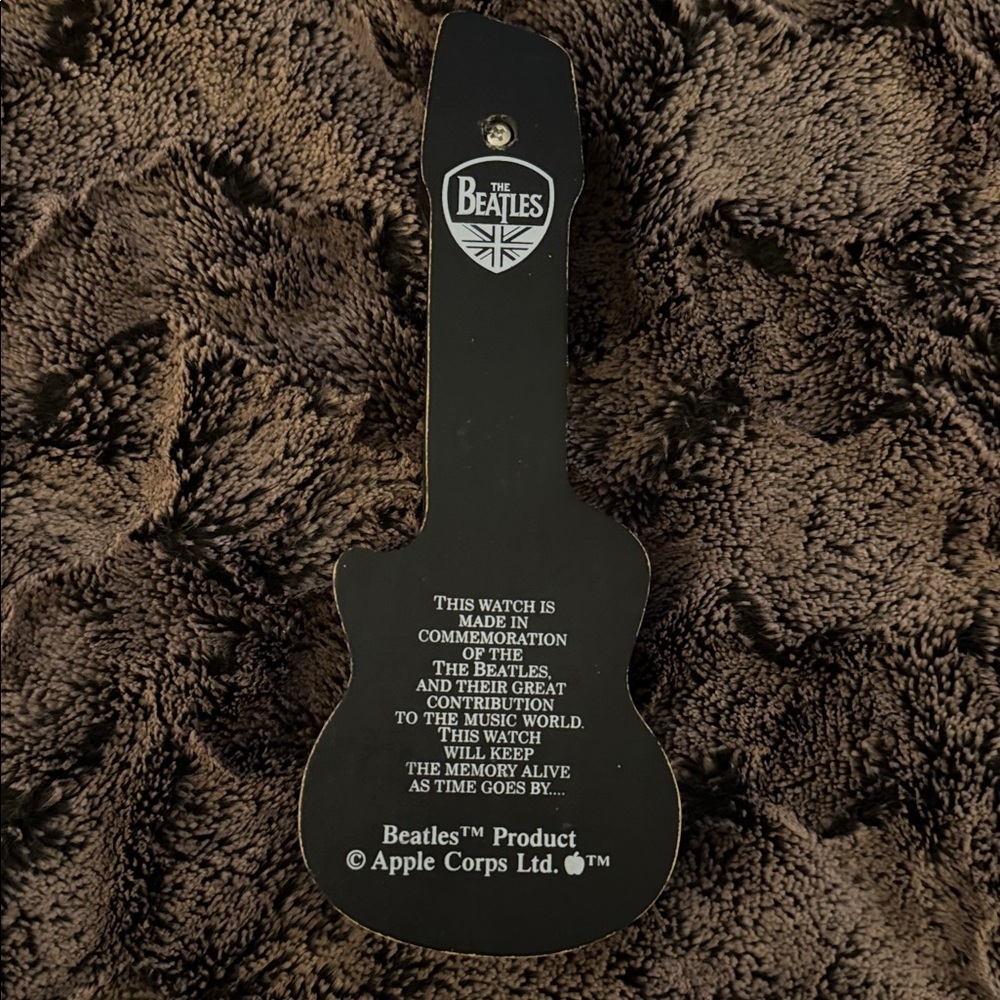 The Beatles Apple Corps Ltd. watch in its original wooden guitar-shaped case. - Picture 4 of 10